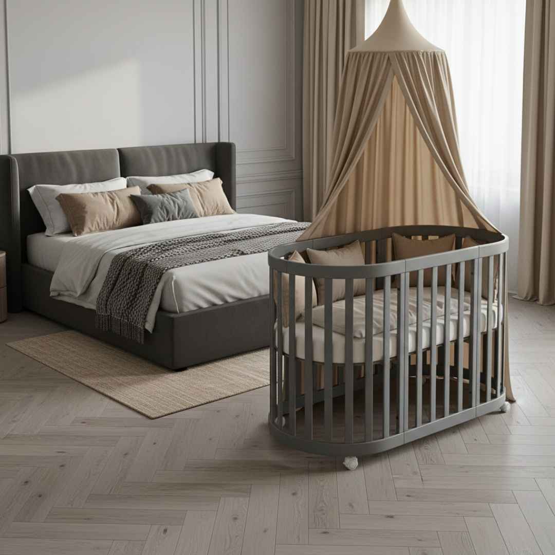 [Šedá oválná postýlka]